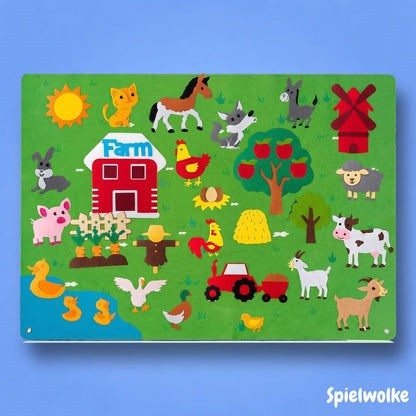 Montessori-Filzbuch Bauernhof-Motiv auf blauem Hintergrund