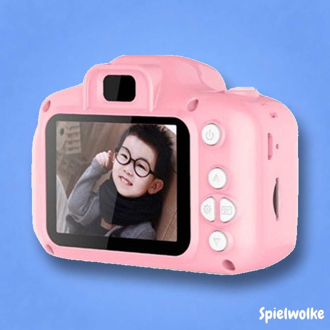 Kinderkamera in Pink auf blauem Hintergrund, digitale Mini-Kamera