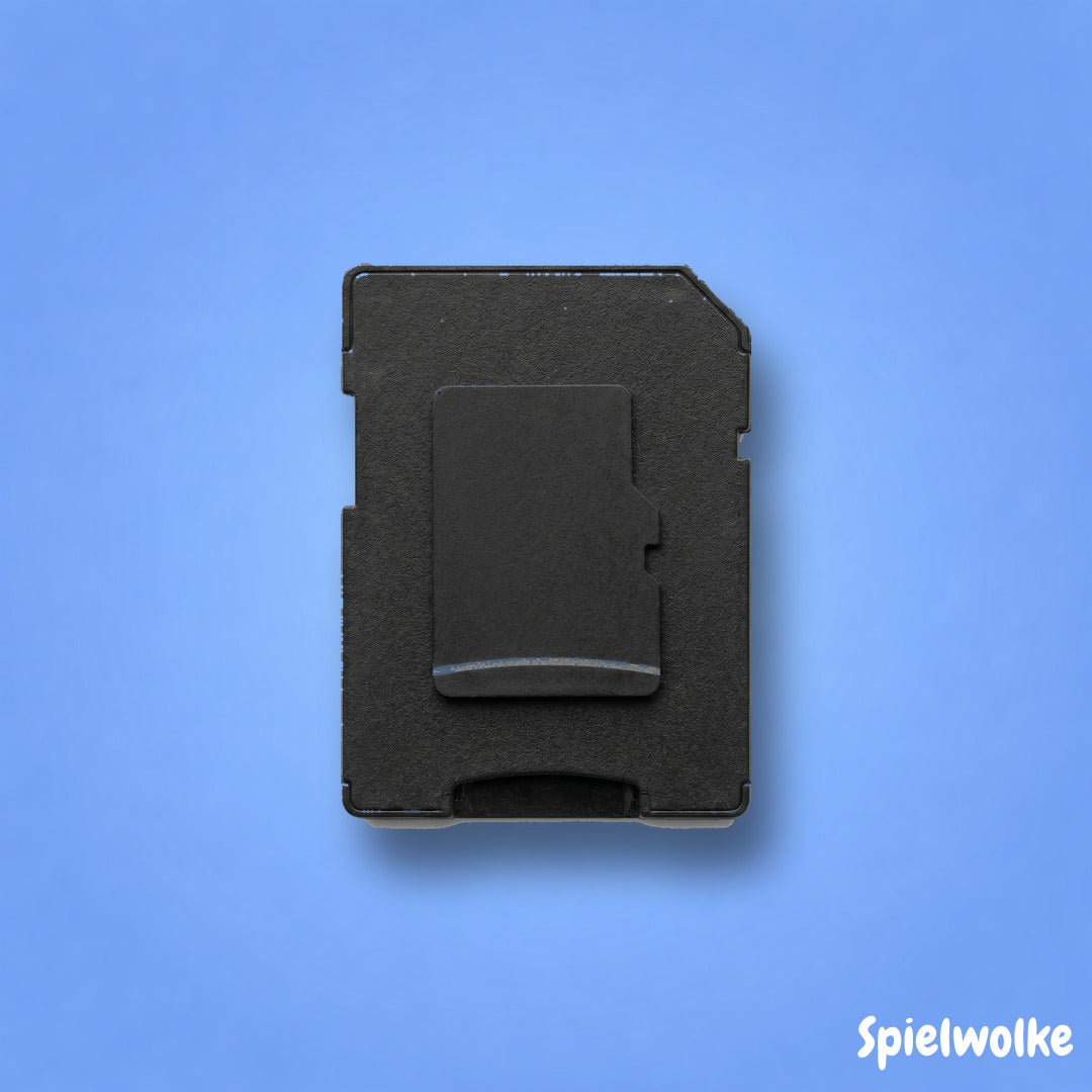 Mitgelieferte 32GB Speicherkarte zur Kinderkamera auf blauem Hintergrund