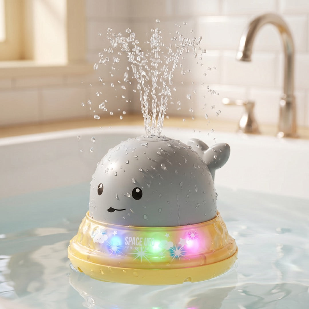 Spritzwal sprüht Wasserfontäne mit buntem Lichteffekt in der Badewanne